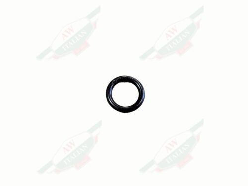 small black rubber circle on white background