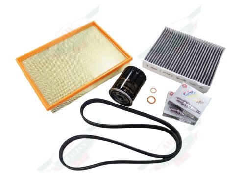 orange and cream colored square filter, black rubber belt, and black cylindrical oil filter on white background