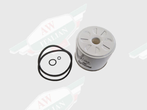 white metal cylindrical oil filter and black rubber bands on white background