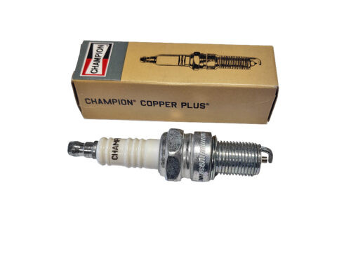champion white and silver spark plug with gold rectangular box