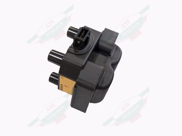 black plastic box ignition coil in white background