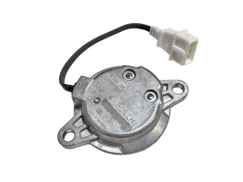 grey circle with black wire