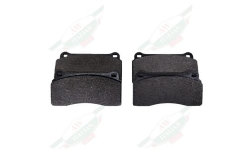 four black square brake pad on white background