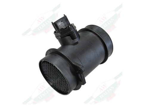 black plastic cylinder object with plug in middle