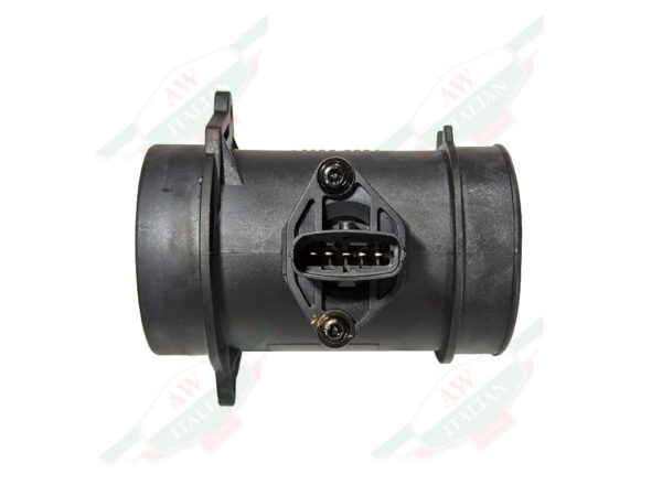 black plastic cylinder object with plug in middle