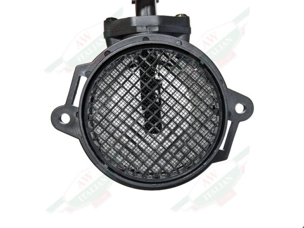 black plastic cylinder object with plug in middle