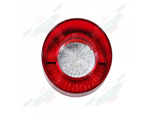 red plastic tail light with white clear center