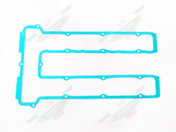 green c shaped paper gasket with holes