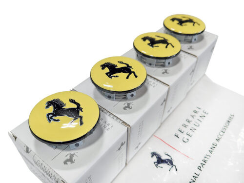 4 yellow circles with black horses in center