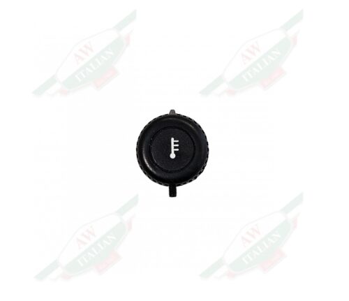 black circular plastic cap on white background