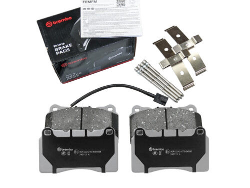 grey and black brembo brake pads with hardware