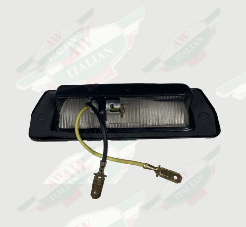 clear black plastic light with wires on white background