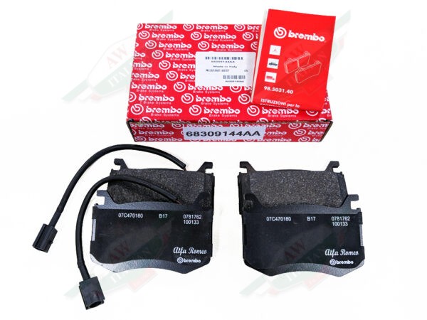 black brake pads and red box on white background