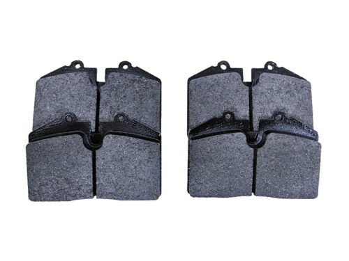 4 brake pads on white background