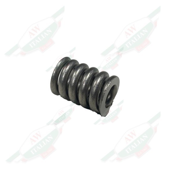 grey metal spring laying horizontally on white background