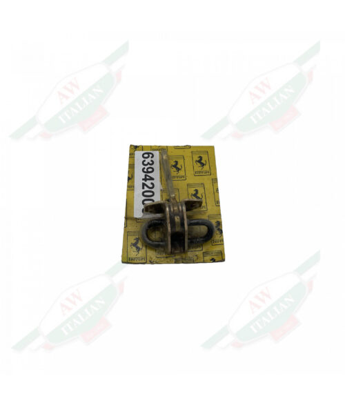 Gold metal wrapped in plastic on yellow cardboard on white background