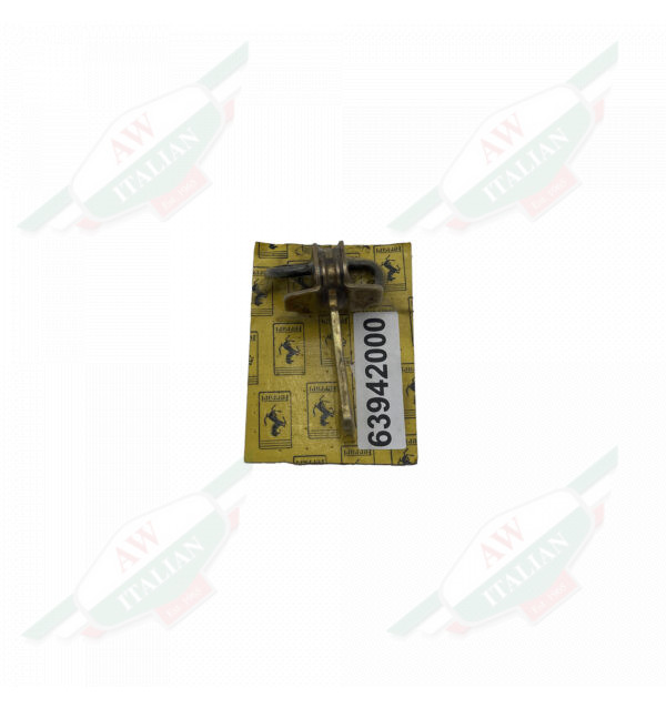 Gold metal wrapped in plastic on yellow cardboard on white background