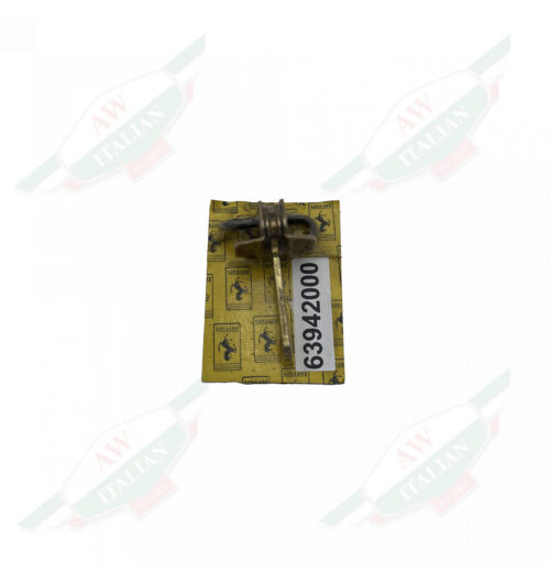 Gold metal wrapped in plastic on yellow cardboard on white background