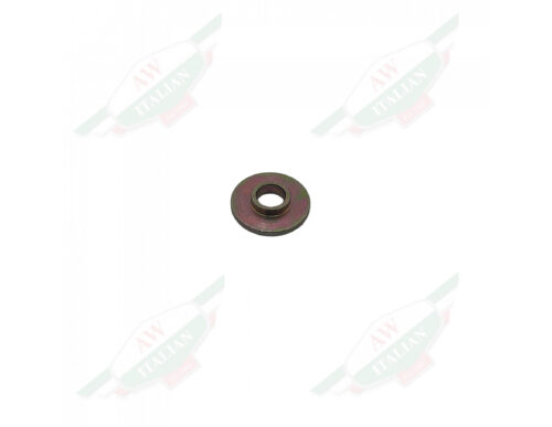 metal flat round washer with hole in the middle on white background