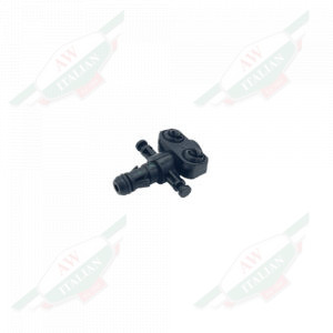 Black plastic cross shaped object on white background
