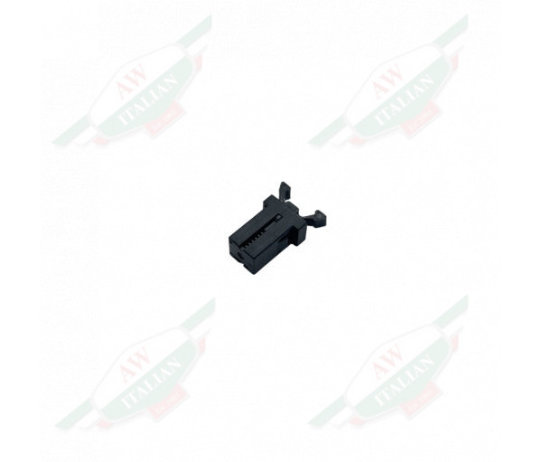Black plastic object on white background