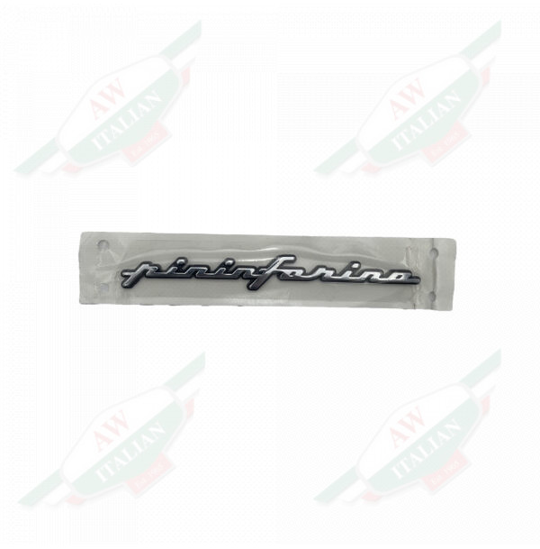 Silver badge with lettering on white background
