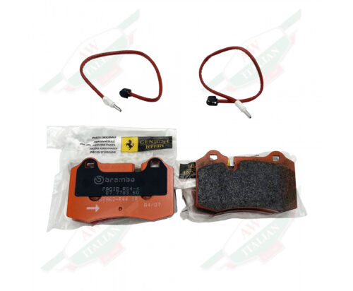 Orange metal objects with 2 orange wires on white background