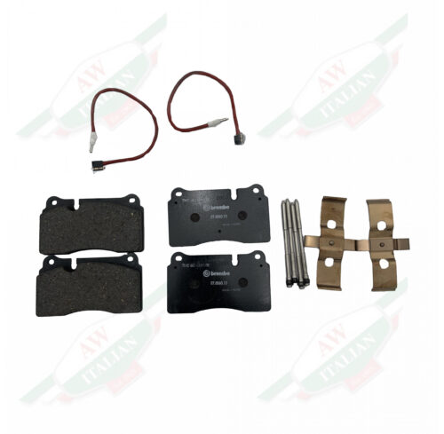 Black metal rectangles with two wires and metal bracket and pins on white background