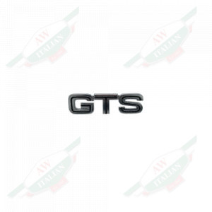 Silver lettered badge on white background