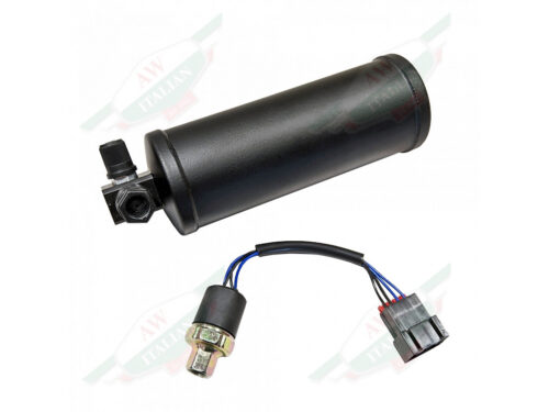 black metal cylinder with threaded fittings on top and sensor wire
