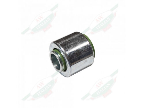 silver metal cylinder with green rubber edge and hole through center