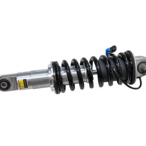 silver shock aborber with black coil spring