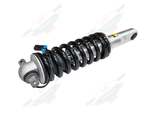 silver shock aborber with black coil spring