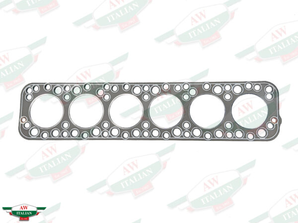 grey rectangular head gasket with 6 big holes
