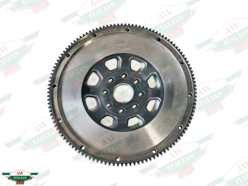 metal circle with holes in center and teeth on outer edge