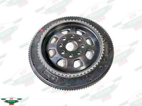 metal circle with holes in center and teeth on outer edge