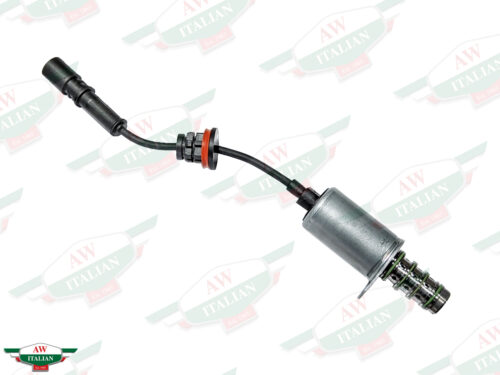 metal cylinder with black wire attached