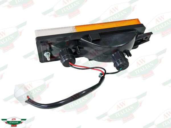 orange and clear rectangular light with black wire