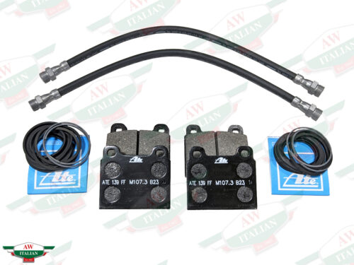 group of black hoses, rings, and square metal brakes on white background