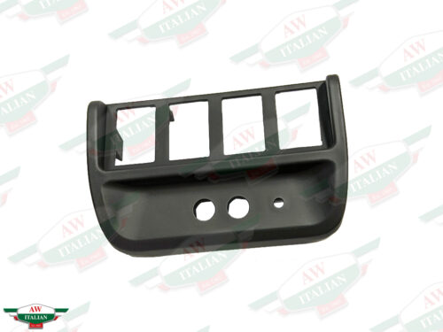 black plastic trim with 4 rectangular holes and 2 circular holes