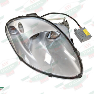 silver headlight with black wire