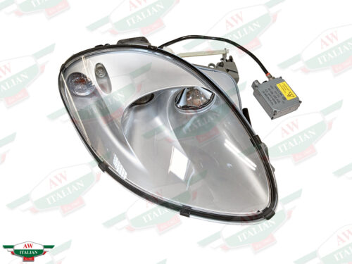 silver headlight with black wire