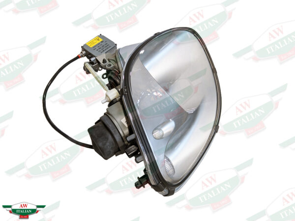 silver headlight with black wire