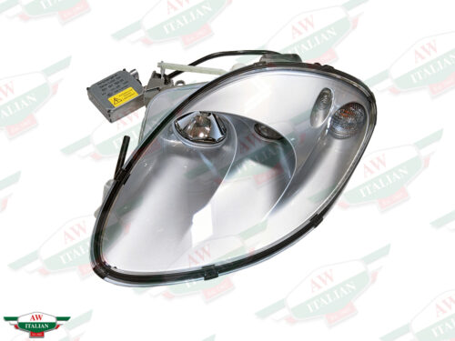 silver headlight with black wire