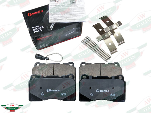 brake pads with wire and metal clips and black brembo box
