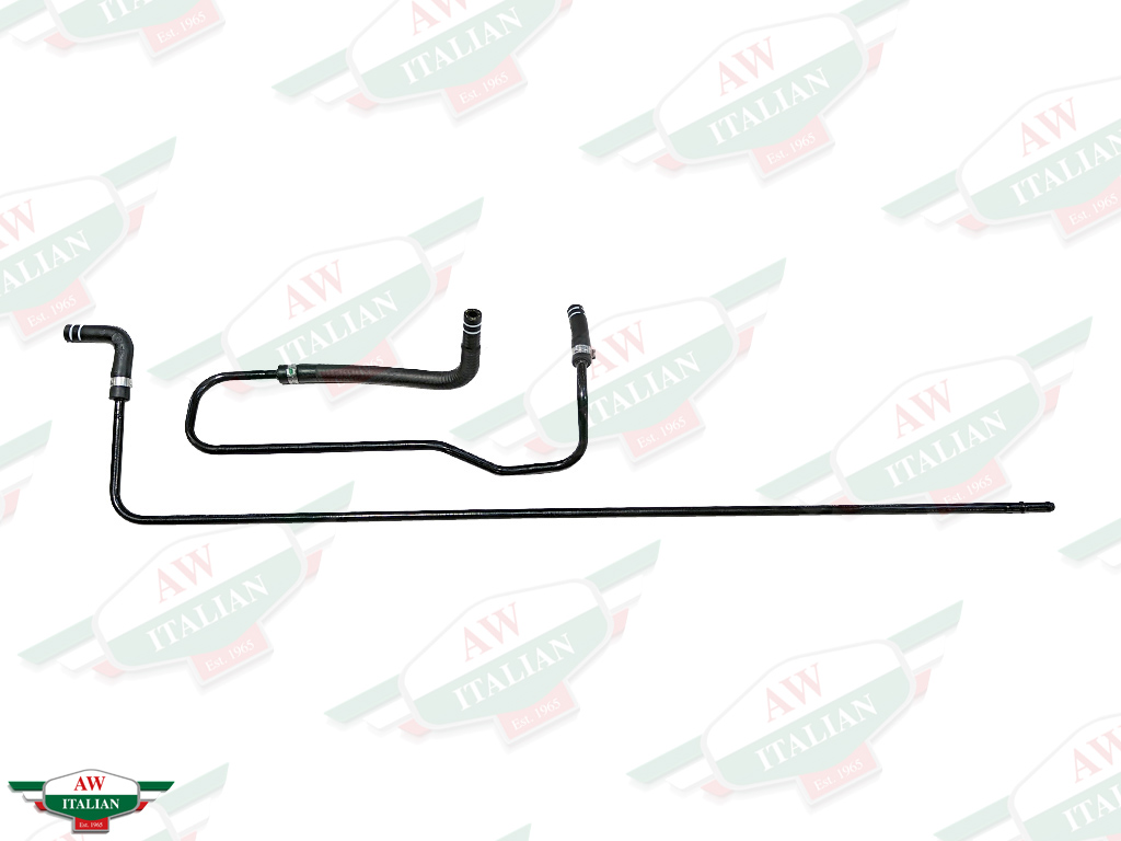 black bent thin metal tubes with hoses attached