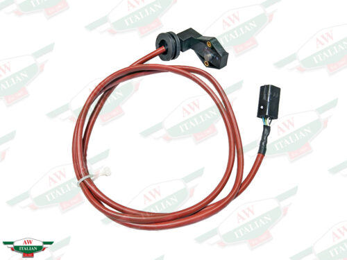 red coiled up wire with black ends