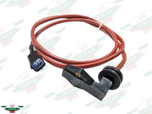 red coiled up wire with black ends