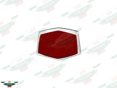 grey and red metal badge