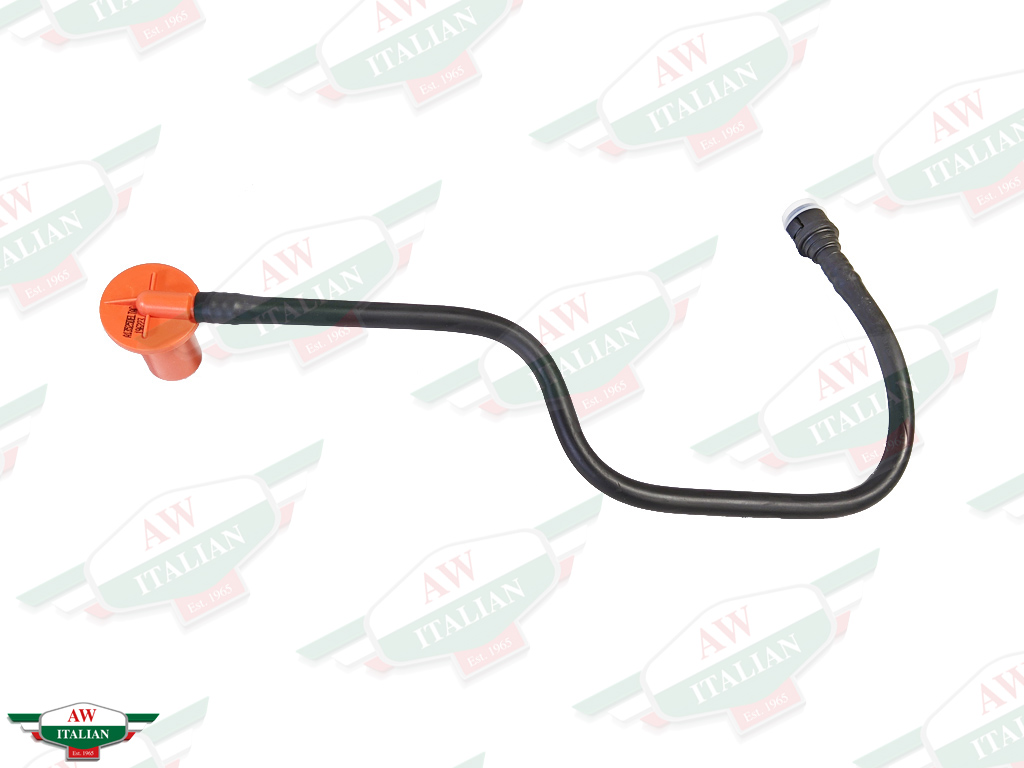 orange plastic cylinder with black hose attached